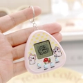 Pink triangle virtual electronic pet game console with cute cartoon print and keychain - Triangle/Macaron Pink