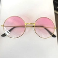 Detail view of retro round sunglasses with gold metal frame and pink gradient lenses - Gradient Pink