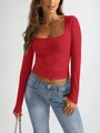 Detail of red long sleeve U-neck top featuring ruched chest and cute bow knot detail - S / Red