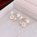 Golden butterfly stud earrings with blue stone inlay and white floral detail - Gold Blue (71# Silver Earring Post)