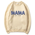 Apricot Mama Est 2025 hoodie with floral patterned lettering and soft knit texture - Khaki