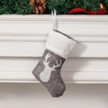 Grey linen Christmas stocking with white deer silhouette and fur trim on fireplace - Grey Reindeer Head