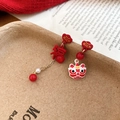 Detail of red asymmetrical earrings featuring lion dance head, Fu character and pearls - Alloy/Silver Pin/Faux Pearl / Chinese Lion Dance Fu Character RICH Pendant (2#)