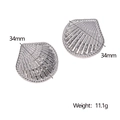 Detailed view of silver shell-shaped earrings with 34mm size and 11.1g weight display - Steel