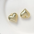 Set of two polished golden 3D heart-shaped resin charms with small hanging loops - 22# K-Gold Heart 22