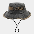 Detail of washed denim bucket hat with newspaper print strap and adjustable drawstring - One Size / Black