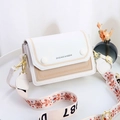 Chic beige and khaki crossbody bag featuring a wide decorative woven shoulder strap - White