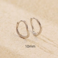 Irregular wave pattern S925 sterling silver hoop earrings in bright silver 10mm size - (10mm) White Gold / 925 Silver