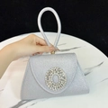 Elegante silberne Glitzer-Abendtasche mit trapezförmigem Körper und Strass-Verschluss - Silber