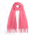 Pink cashmere-feel scarf with fringe tassels on soft white faux fur background - Watermelon red