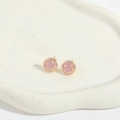 Detailed view of pink enamel smiley face earrings on a cloud-shaped ceramic tray - Pink