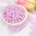 Perle tonde in acrilico viola traslucido per gioielli fai da te in una ciotola bianca - Tondo Viola Trasparente 8mm (110 pezzi)