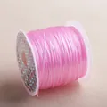 Pink flat crystal stretchy bead cord on a spool for jewelry making, 100% polyurethane - Light Rose