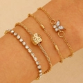 Golden 4-piece bracelet set with rhinestone butterfly charms and layered tennis chain - Gold (6571)
