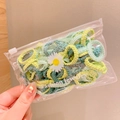 Lot d'élastiques à cheveux pour enfants tons verts dans une pochette zippée marguerite - Lot de 50 / Vert