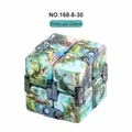 Infinity Cube stress relief toy with green dinosaur pattern and metallic connectors - Dinosaur Green