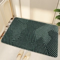 Detalle del felpudo de PVC verde oscuro con rayas geométricas en la entrada de casa - 45*75cm / Espacio Geométrico-Verde