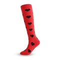 Knee-high compression socks in vibrant red featuring stylish black heart patterns - Red Black Heart