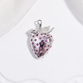 Detailed macro shot of a silver strawberry pendant featuring sparkling pink gemstones - VD1655 White Gold Rose Red Zircon Strawberry