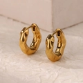 Detailed close-up of gold hoop earrings with irregular lava texture and polished finish - Gold Thick Crumpled Texture