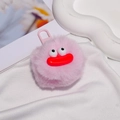 Close-up of fluffy pink plush keychain with funny cartoon eyes and red sausage lips - Gate Buckle Style / Pink