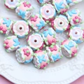 Hand-painted clay beads in pink, blue, green and white on a white relief plate - White Bead Pink Flower Blue K