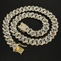 Detail of 14mm Cuban link necklace featuring blue and clear pavé stones on gold plating - Dragon Clasp Half Blue Gold