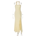 Detail of light yellow strapless dress with a high slit and halter neck design - S / Yellow