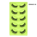 Detail of 5 pairs of thick cat-eye false eyelashes with crossed patterns on a green tray - 3D Natural Long Cross Style (3DMAO-36)