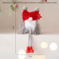 Plüsch-Weihnachtswichtel mit rotem Sternhut, grauem Fell und langen, hängenden Beinen - Rot/Grau