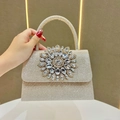 Elegant gold evening bag with sparkling rhinestones and large crystal flower ornament - Champagne