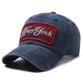 Distressed dark blue denim baseball cap with New York patch embroidery and vintage wash - Navy Blue