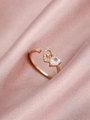 Golden open heart ring with sparkling crystal stone on soft pink satin fabric - Gold Heart Zirconia Open Ring (11294)