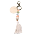 Boho keychain with pink and green silicone beads, wood disk, and beige cotton tassel - Ivory