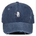 Detail of distressed navy blue denim cap with cartoon ghost embroidery and ripped holes - One Size / Navy Blue