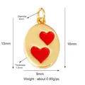 Oval copper charm with glossy gold finish and two red enamel hearts for DIY jewelry - L70 Heart Drip Red Gold
