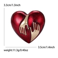 Cute red enamel heart brooch with golden hugging hands, measuring 3.3cm x 3.5cm - KC Gold & Red