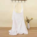 Detail showing soft white double-layer muslin cotton nursing cover on a wall hook - Pure White