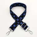 Detail of blue star pattern on thick woven canvas strap with silver metal swivel hooks - Black Base Blue Star Silver Buckle