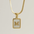 Gold square shell pendant necklace featuring a 3D embossed letter M on white inlay - Letter M