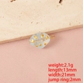Macro detail of a glass seashell pendant with gold dots, 21x13mm ocean charm for DIY jewelry - Light Green Single Hole (Gold Color Ring)