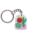 Pink cartoon cactus keychain in soft PVC featuring a desert design and silver keyring - Cactus Scenery