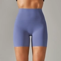 Close-up of high-waisted wide waistband on breathable blue-purple yoga shorts - Purple Blue
