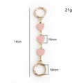 Detailed view of pink enamel heart bag charm with gold metal clasp measuring 14cm long - Pink Triple Heart