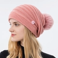Roze gebreide muts voor dames met grote imitatiebont pompon en knoop aan de zijkant - Roze