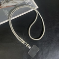 Detail view of sparkling rhinestone crossbody phone strap with dual metal lobster clasps - Silver