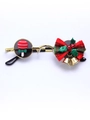 Détail de lunettes de Noël en métal doré avec noeud écossais et décor de cloches - Monture Dorée Verres Noirs Sucette