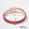 Detailed close-up of golden diamond-shaped open bracelet with marquise red zircons - Gold Base with Red Gem (B00432-2)