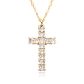 Macro view of gold cross pendant with micro-pave cubic zirconia on a fine chain - Luxurious Round Pave Style (B248)