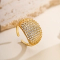 Macro shot of gold-plated open ring with shimmering pavé-set zircons on stone surface - 14491-Geometric Wide Style